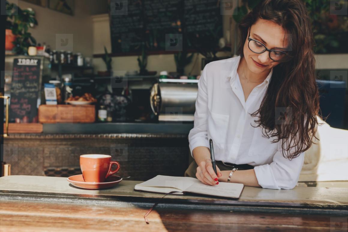A writer at work — close focus on a manuscript with annotations